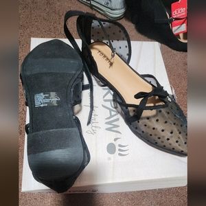 Black flats with ankle strap and bow